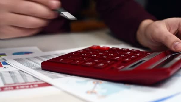 Name: depositphotos_142227000-stock-video-trader-hand-using-red-calculator.jpg Views: 154 Size: 16.3 KB